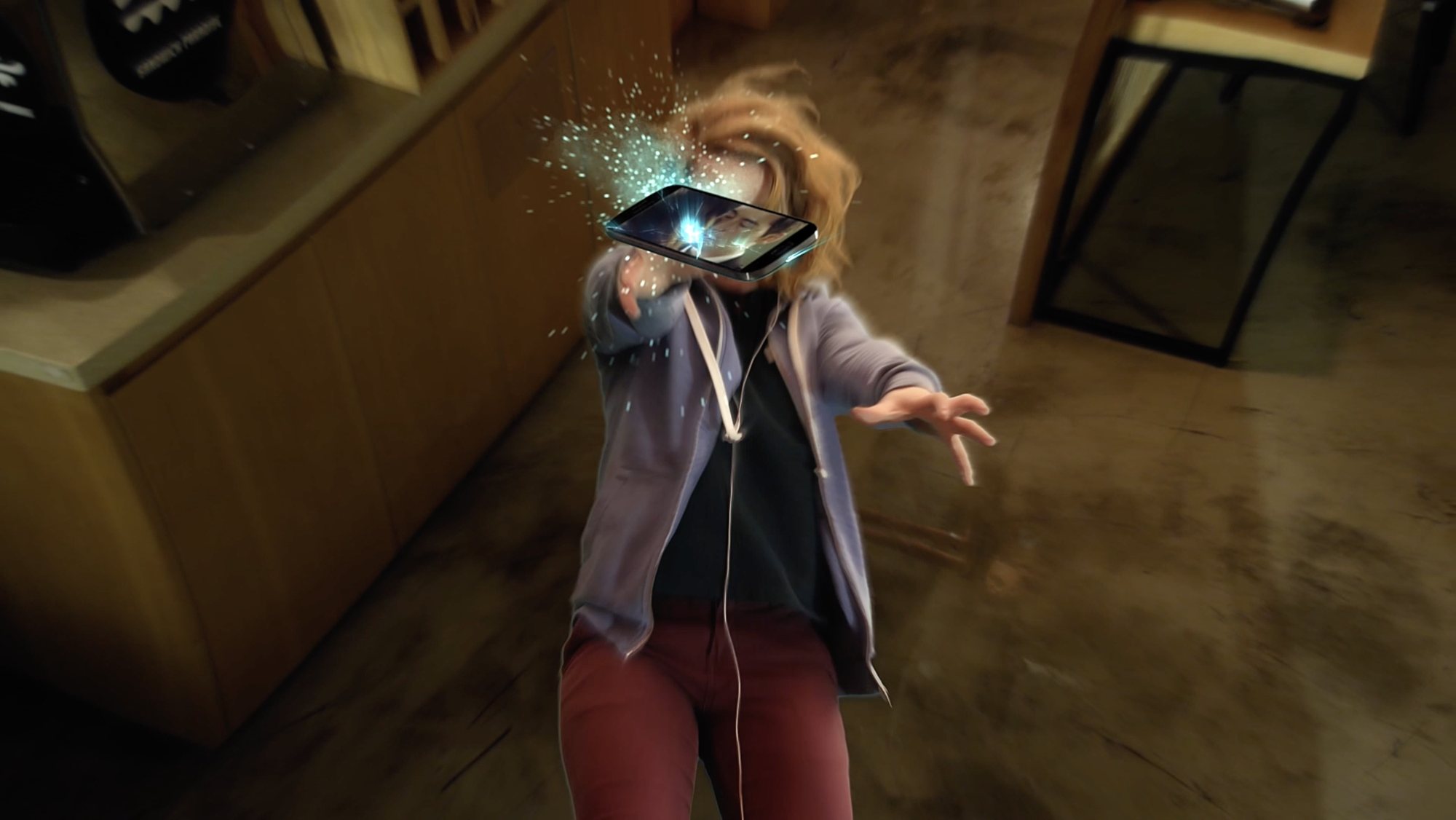 Claire is pulled into her phone in a burst of light
